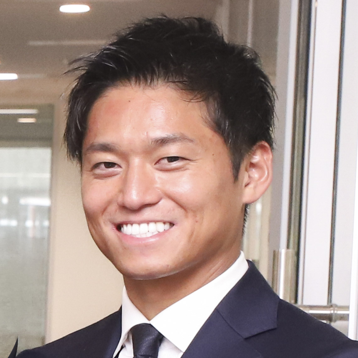 企業情報部　主任　吉田 健人