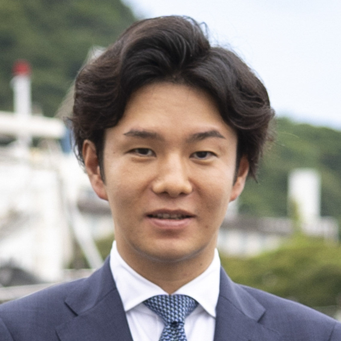 企業情報部　課長　佐々木 貴義